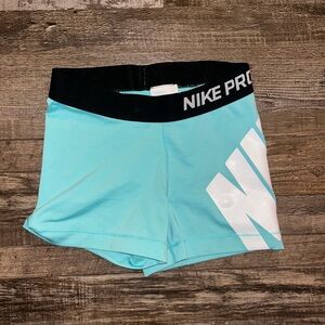 Teal Nike Pro shorts